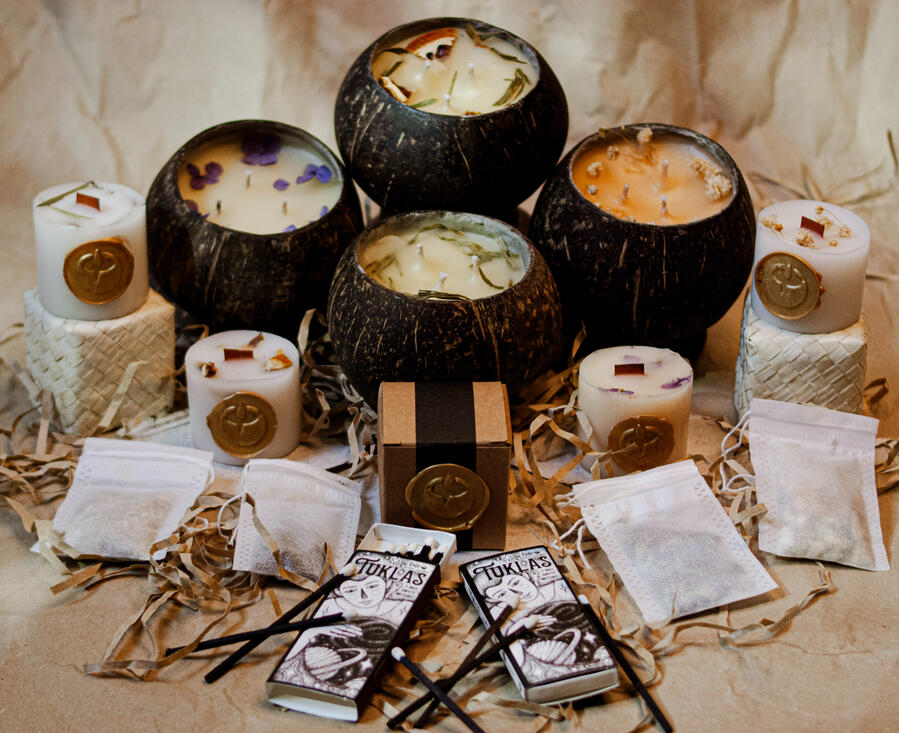 coconut shells with beeswax candles inside