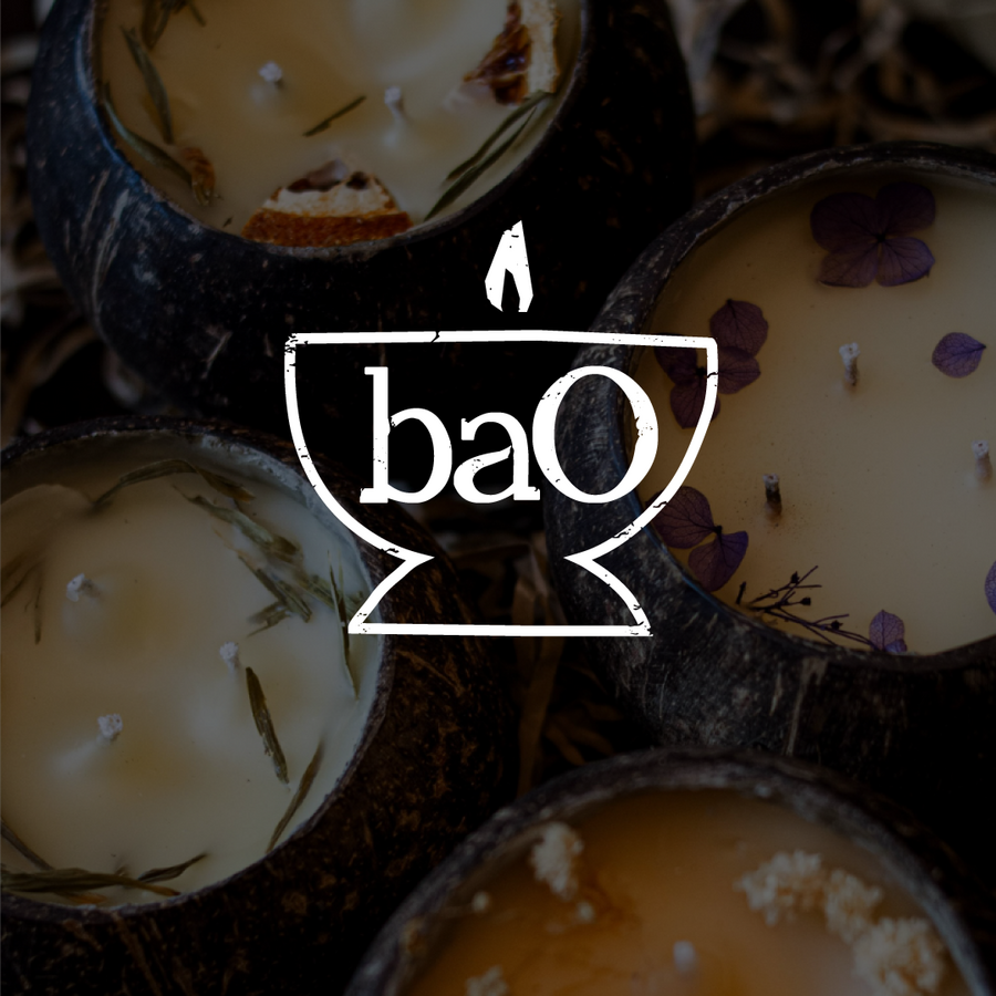 coconut shells with beeswax candles inside